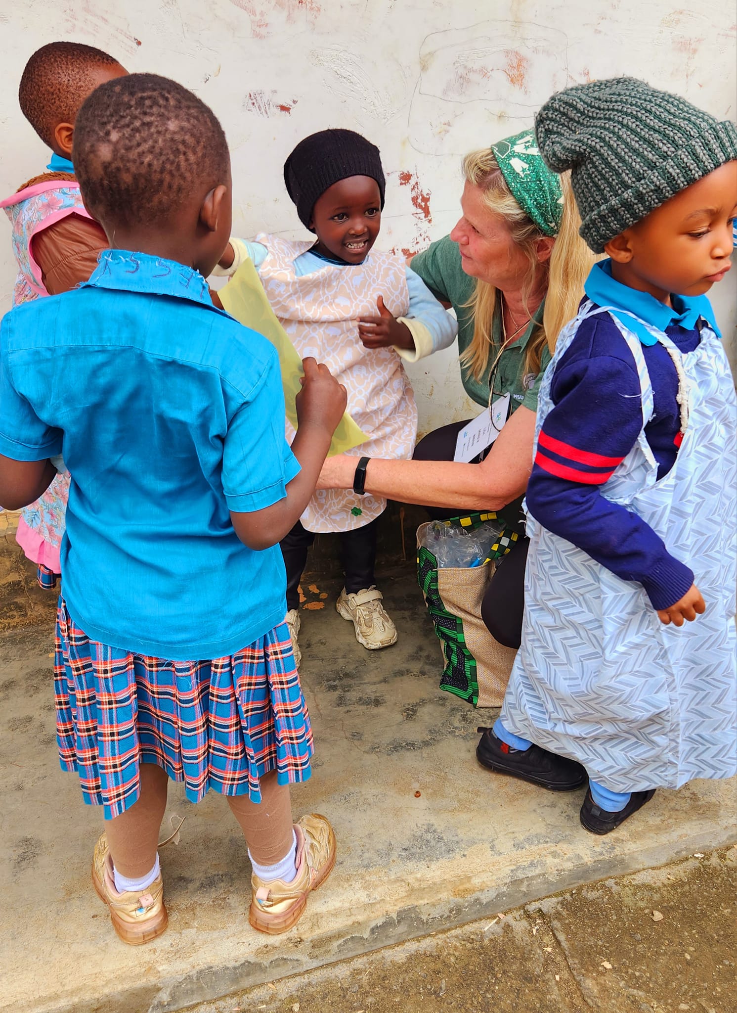 Dress being presented to children.